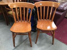 A pair of pine chairs