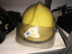A Cairns USA Felton fire department firemans helmet