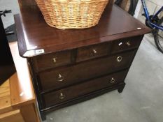 A 3 over 2 chest of drawers