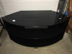 A 3 tier black glass effect TV stand