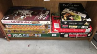 A quantity of vintage board games & jigsaws including mastermind & the Royal wedding etc.