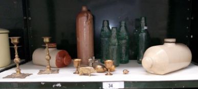 A mixed lot including stoneware glass bottles & brassware