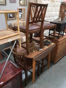 A set of 1930's oak dining chairs with formica dropside dining table
