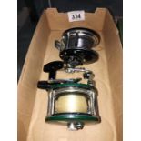 2 fishing reels including Winfield