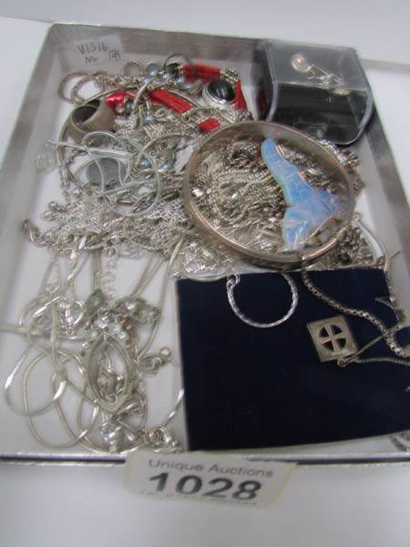 A mixed lot of jewellery including some silver items, bangle, chain,