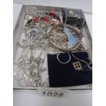 A mixed lot of jewellery including some silver items, bangle, chain,