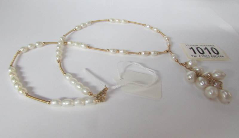 A string of pearls mounted on silver gilt