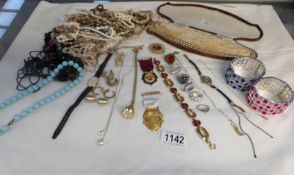 A mixed lot of costume jewellery including gold ankle chain, ladies gold wrist watch,