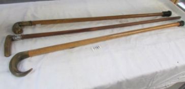 3 walking sticks with horn handles