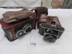 An original Gauthier Liedwig Lausa - Dresden camera and an Argoflex camera with cases
