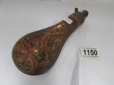 A 19th century powder flask