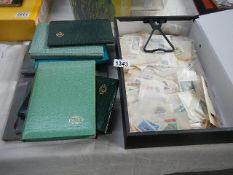 9 albums and a box of stamps including Japan,