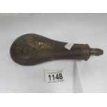 A 19th century powder flask,