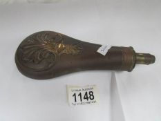 A 19th century powder flask,