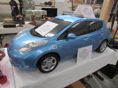 A Nissan main dealer car showroom model of a Nissan Leaf electric car,