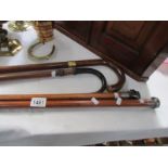 4 walking sticks including silver mounts,