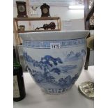 A large blue and white oriental jardiniere