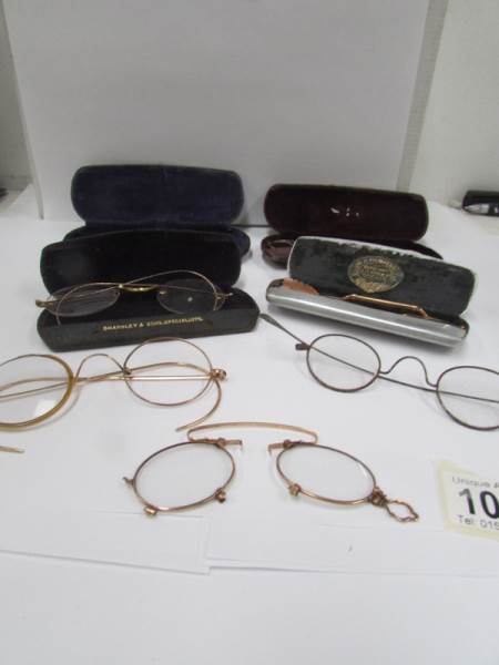 7 pairs of old spectacles 4 being in cases