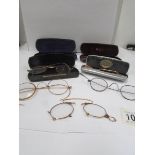 7 pairs of old spectacles 4 being in cases