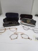 7 pairs of old spectacles 4 being in cases