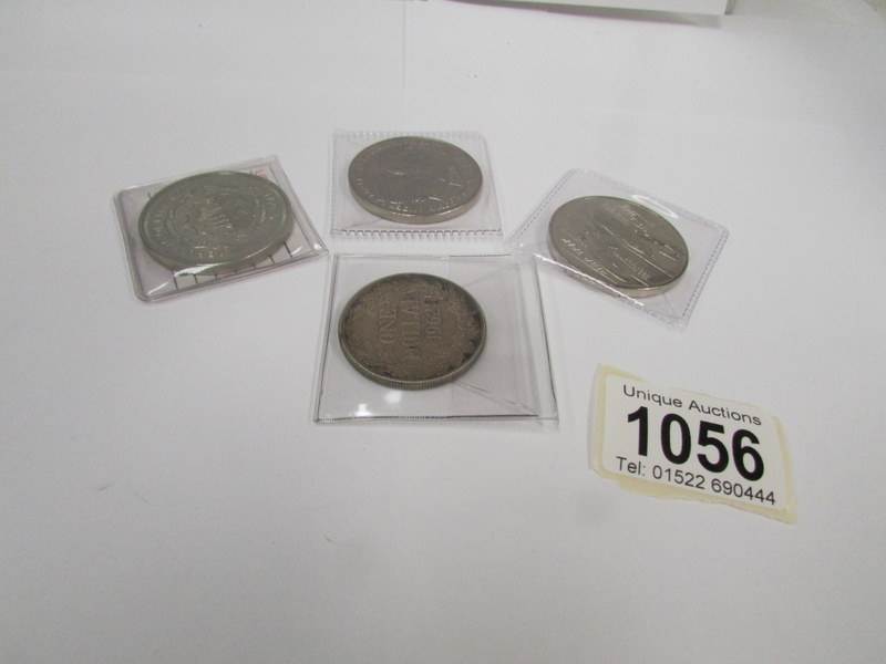 A Liberia silver 1 dollar 1962, a copper nickel 1996,