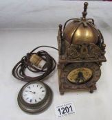 A brass lantern clock and one other