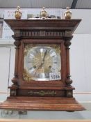 An Edwardian mantel clock with brass mounts,