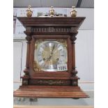 An Edwardian mantel clock with brass mounts,