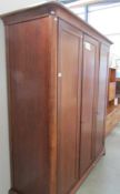 A good quality mahogany 3 door wardrobe