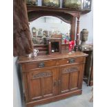 A mahogany mirror backed sideboard