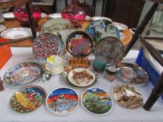 A collection of Poole and Royal Doulton plates together with items of Shelley, Beswick,