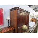 A Willis & Gambier Louis Philippe triple door wardrobe