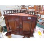 A Victorian hanging corner wall cupboard