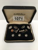 A cased set of cuff links with matching collar studs set with seed pearls and another pair of cuff