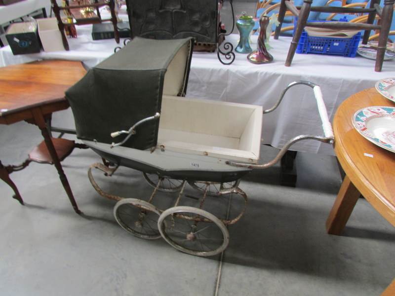 A vintage dolls pram