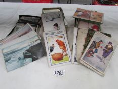 A mixed lot of postcards including Bamforths, comic,