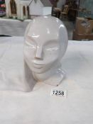 An interesting glazed clay formed visage marked internally M G W E Bendlu Bode