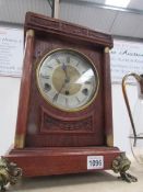 An 8 day silver dial Edwardian mantel clock,