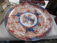 A large early 19th century Imari charger,