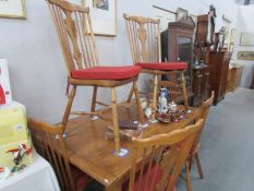 A good quality solid pippy oak dining table and 6 chairs