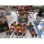 4 painted metal figures of boxers and a staffordshire figure of boxers