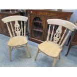 A pair of kitchen chairs