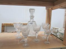 An Edwardian decanter and glasses