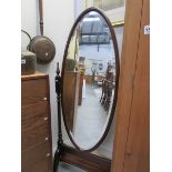 A bevel edged cheval mirror