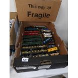 A quantity of 00 gauge model railway items including locomotives, rolling stock, pullman coaches,