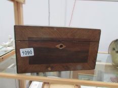 A sewing box and contents