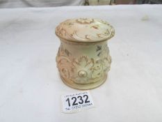 A Royal Worcester pot and cover