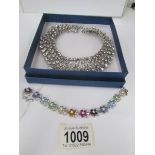A rhinestone jewelled collar necklace and a multi coloured crystal bracelet