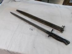 A US army M1917 Remington sword bayonet with scabbard