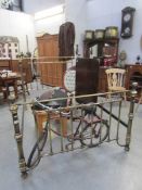 A Victorian style double brass bedstead